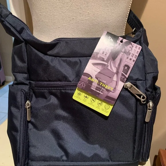 Travelon Blue Messenger Bag with Sleek Design - Picture 4 of 8